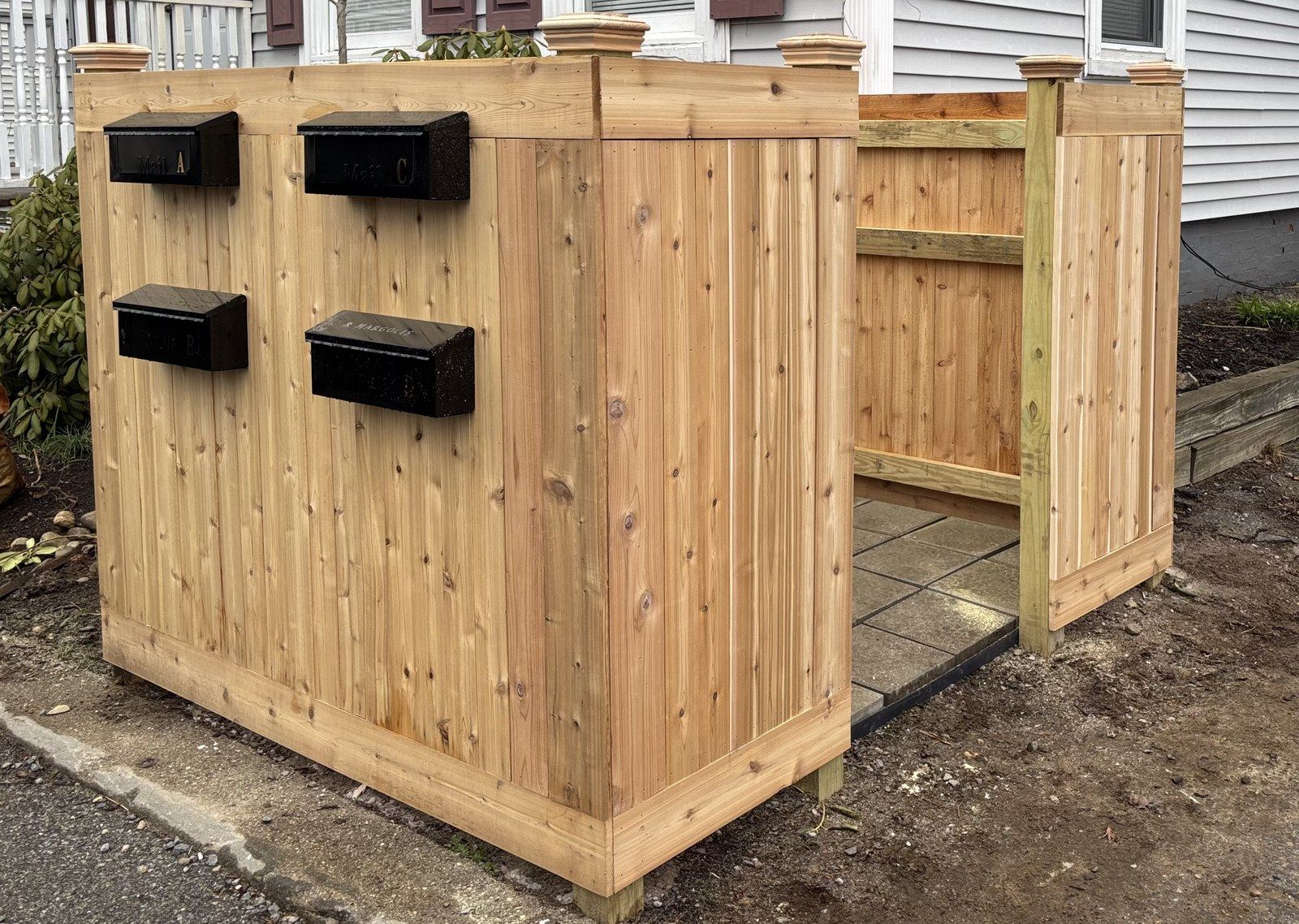 Custom cedar mailbox enclosure built by Northeast Deck and Dock